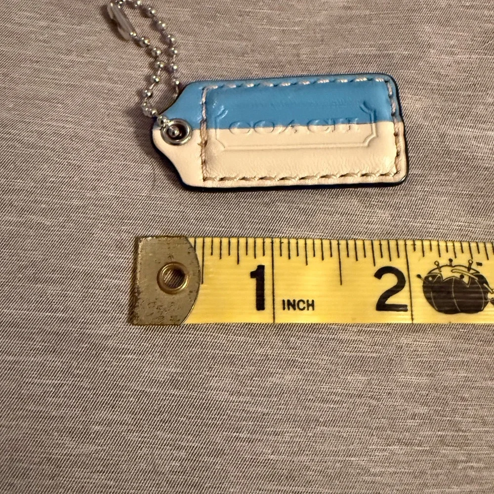 Coach Sky Blue and off white hang tag